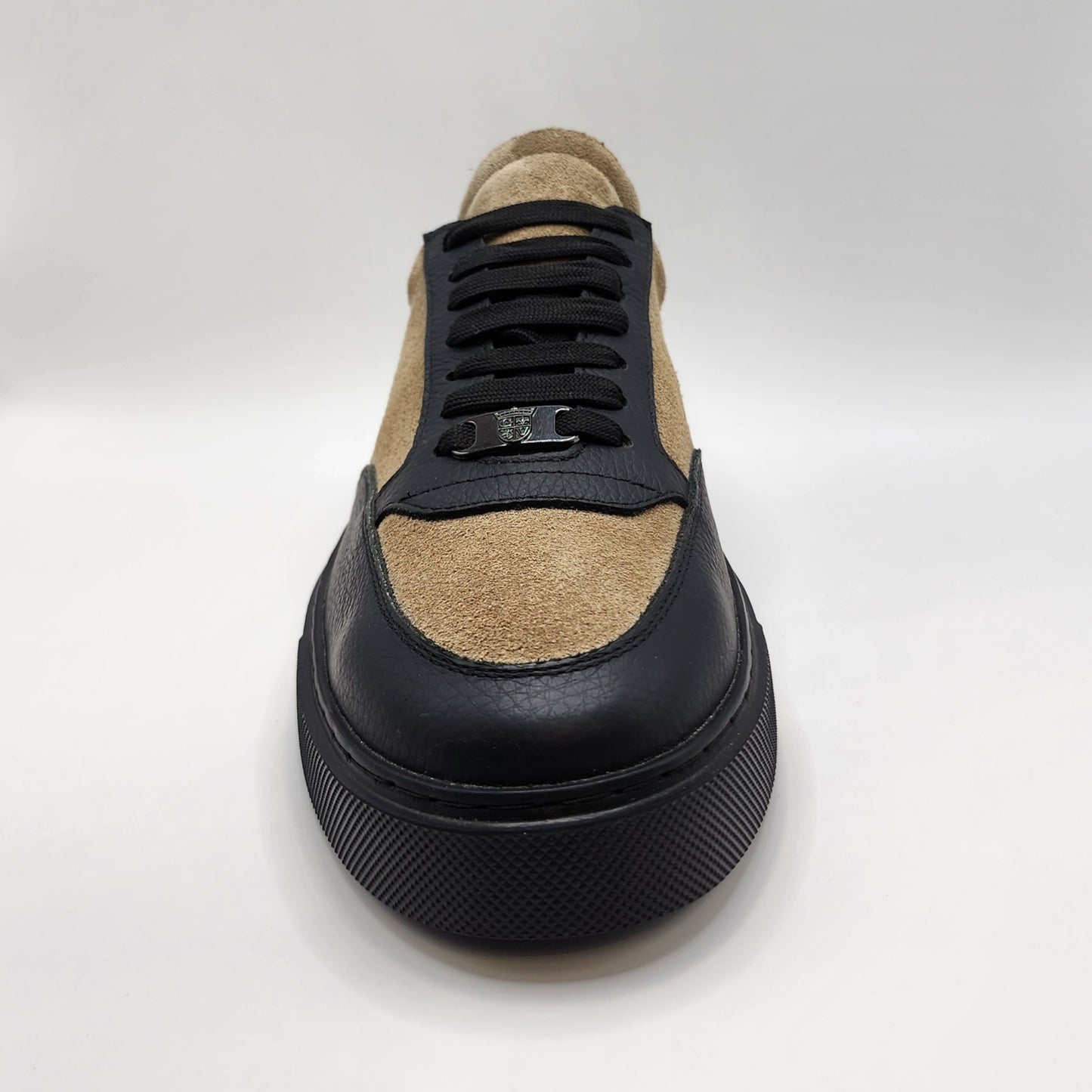 Cream suede and black leather sneakers