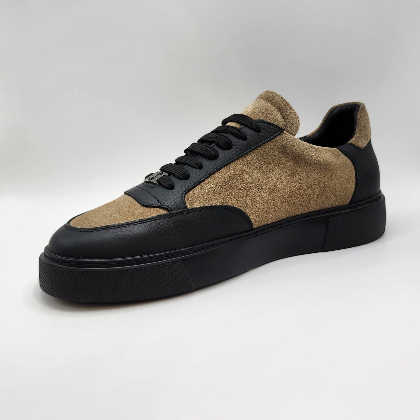 Cream suede and black leather sneakers