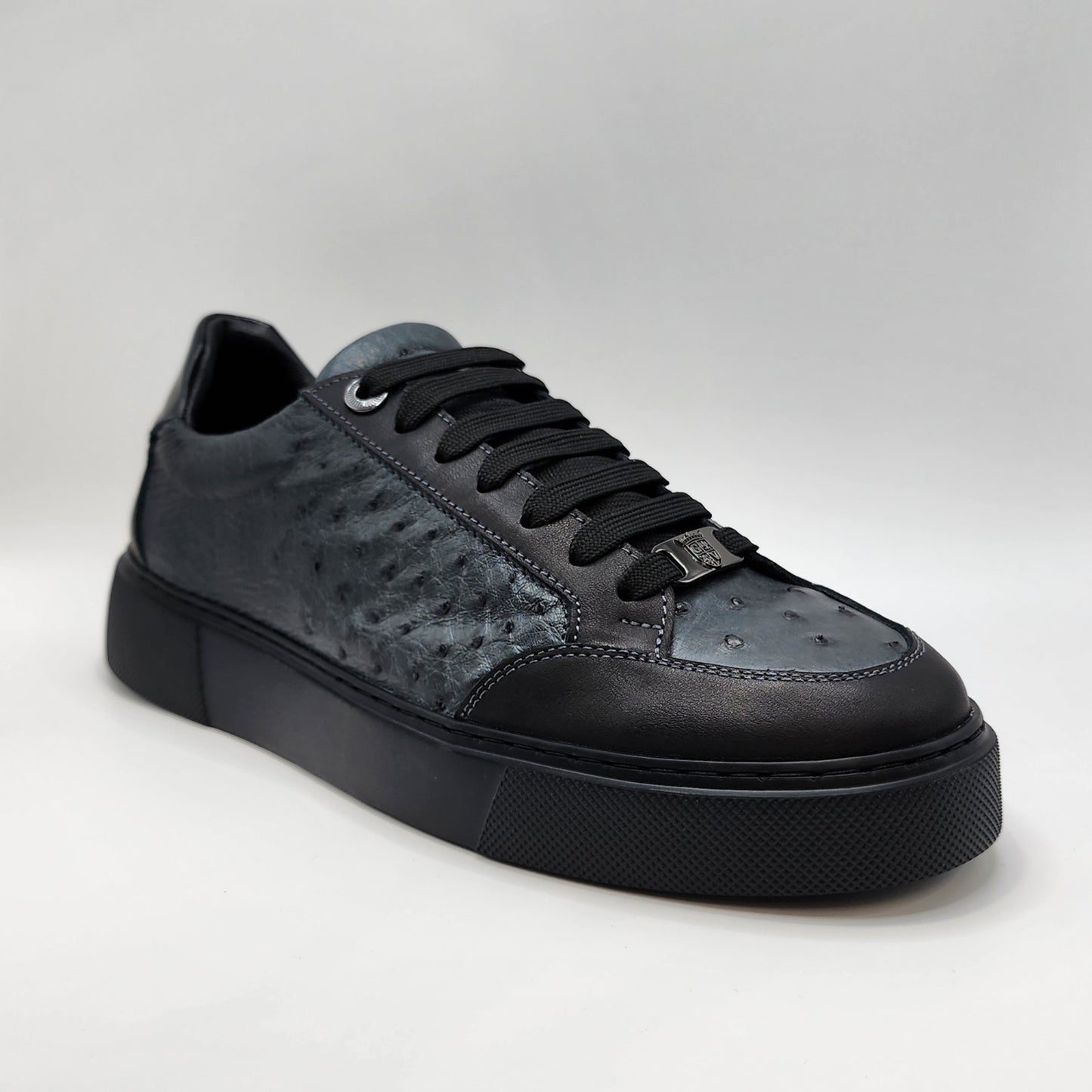 Grey ostrich with black leather sneakers