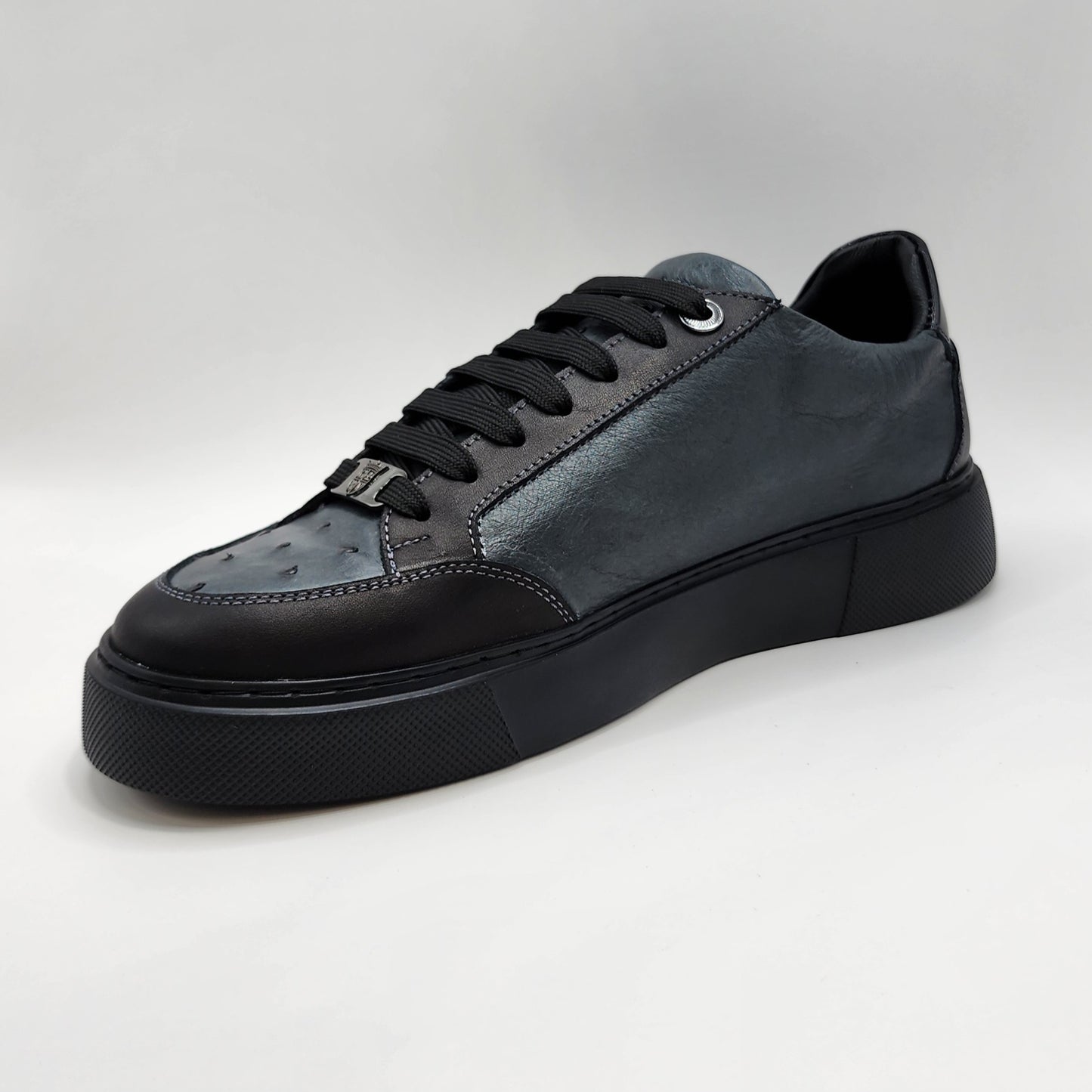 Grey ostrich with black leather sneakers