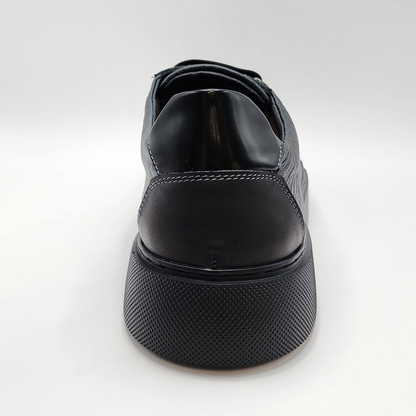 Grey ostrich with black leather sneakers