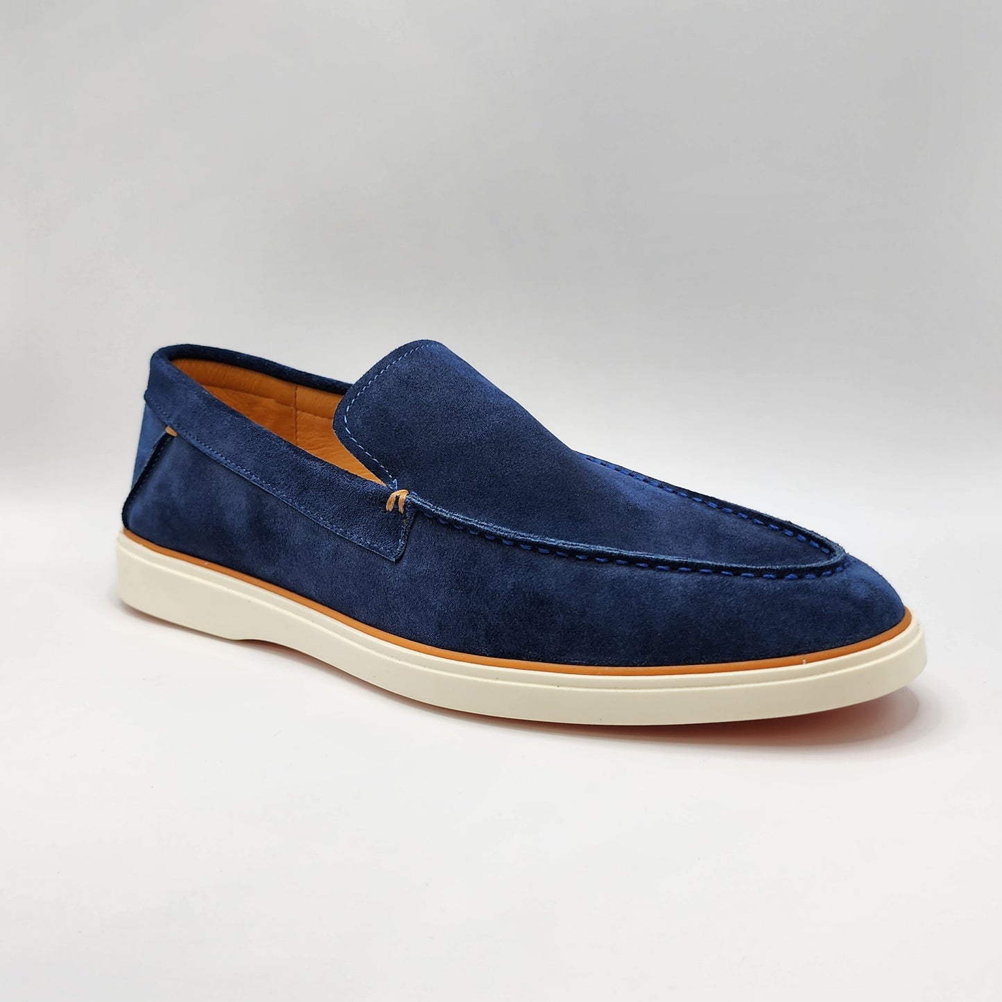 Blue suede loafers with orange shade