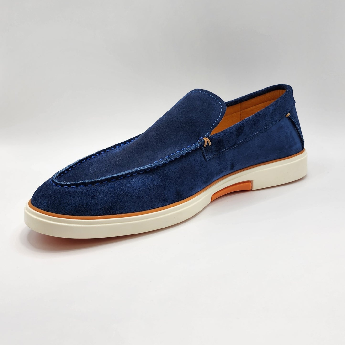 Blue suede loafers with orange shade
