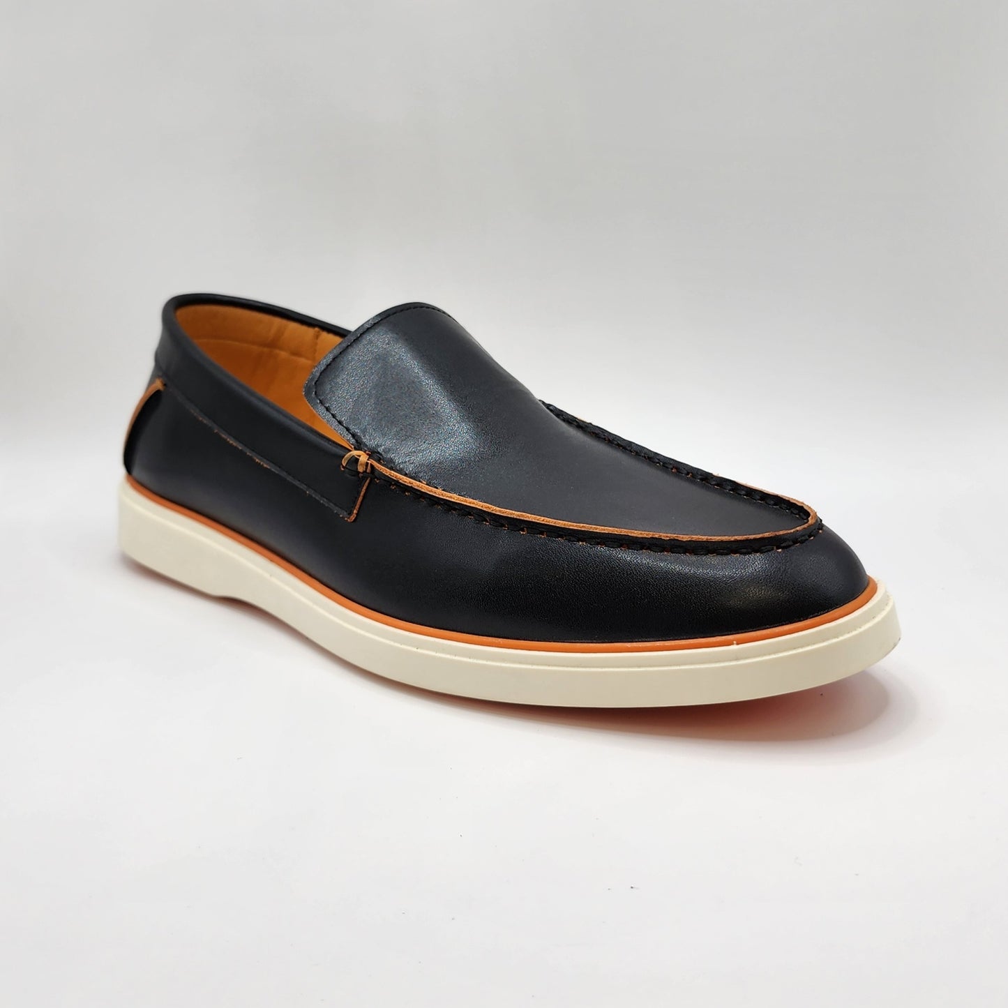 Black leather loafers with orange shade