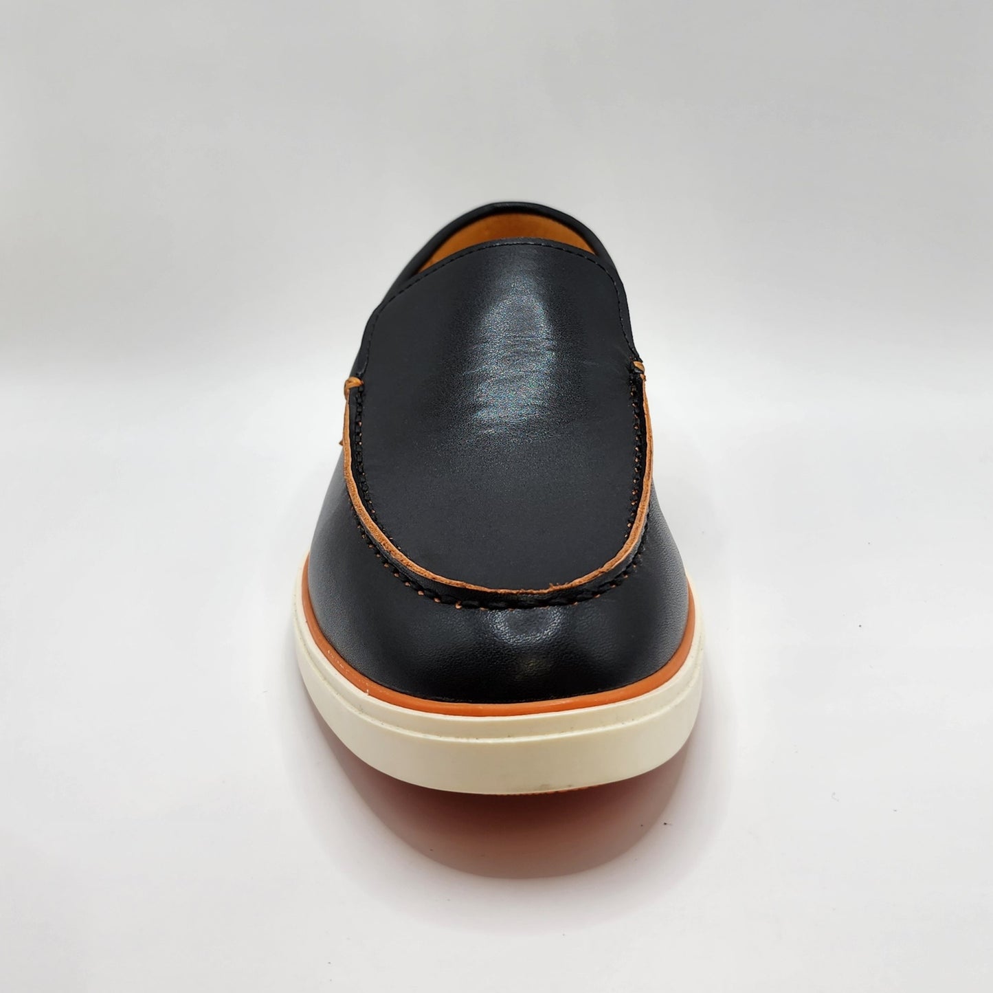 Black leather loafers with orange shade