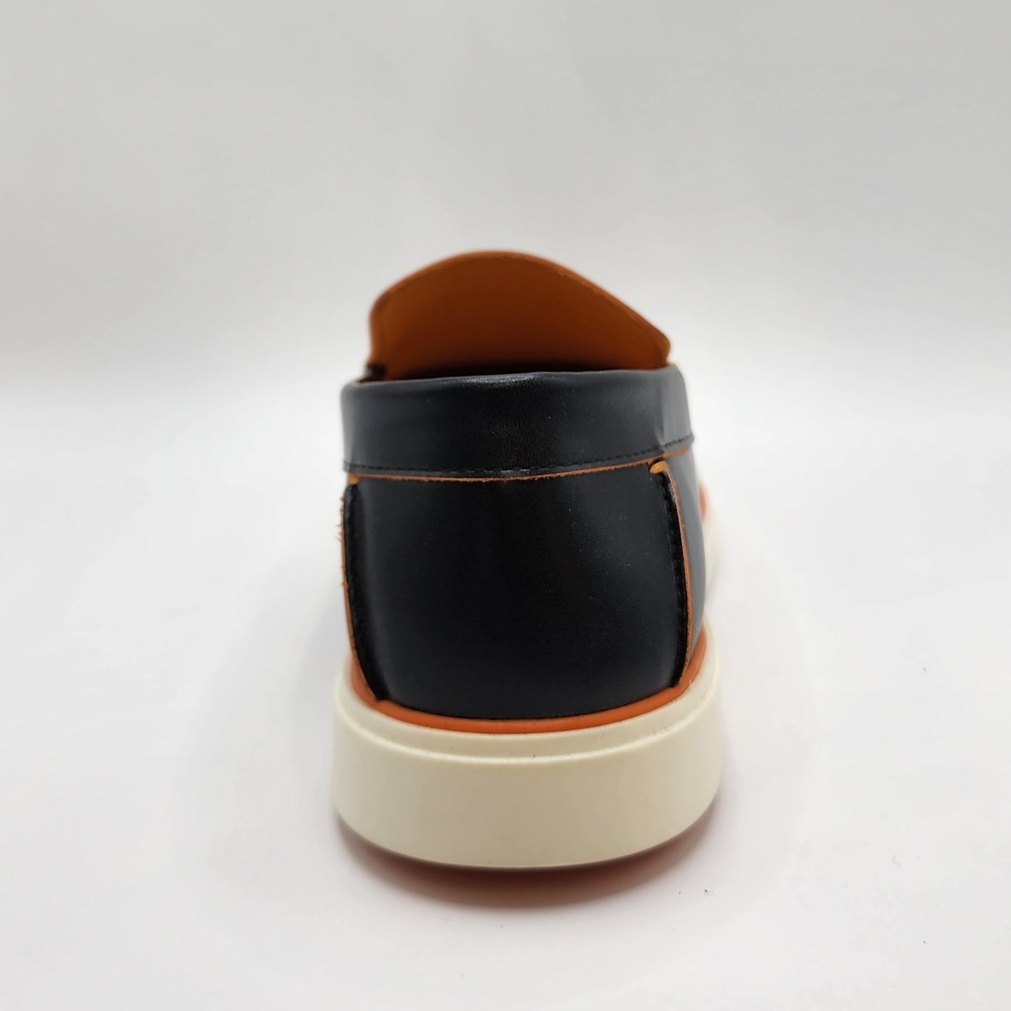Black leather loafers with orange shade