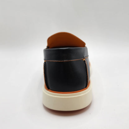 Black leather loafers with orange shade